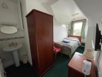 Habitación Individual con ducha y aseo compartidos