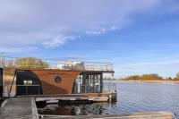 Urlaub im schwimmenden Ferienhaus, mitten in der Natur - Chambres d'hôtes Kützkow