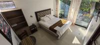 Chambre Lit Queen-Size avec Balcon