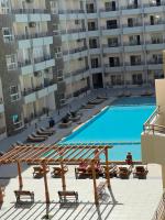 Hurghada Luxury 1BR on Al Mamsha and 2 minutes to the sea with access Al-Hambra - Chambres d'hôtes Hurghada
