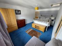 Dreibettzimmer mit Bergblick