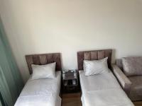Tweepersoonskamer met 2 Aparte Bedden