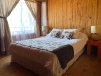Kamer met Queensize Bed en Uitzicht op Zee