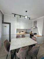 Апартаменты - Ferienwohnung Almaty