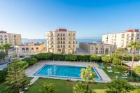 Sea view apartment with traditional Moroccan bathroom, airconditioning, private parking, swimming pool and terrace - B&B Tangeri