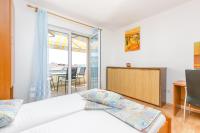One-Bedroom Apartment with Balcony and Sea View