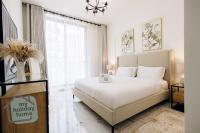 Private Beach 1BR-Yacht Club-Work Space-Pool-Gym - Chambres d’hôtes Ras el Khaïmah