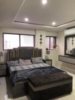 Stay Luxury 1BR central Bahria Town - Ferienwohnung Lahore