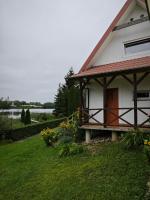 Dom nad jeziorem, własna linia brzegowa, łódka, rower wodny na wyłączność - B&B Grajwo
