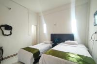 Camera Doppia con Letti Singoli