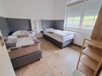 Camera Standard Doppia con Letti Singoli con Bagno in Comune