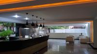 Praia Pitangueiras- Apartamento Quarto e sala - Vaga garagem- Duas quadras da praia- Próximo mercado, bares e restaurantes - Chambres d'hôtes Guarujá
