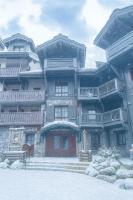 ARC 1950 - Appartement 10 personnes Duplex Cheminée - ski aux pieds - Sauna, Hammam, Jacuzzi, Piscine - B&B Arc 1950