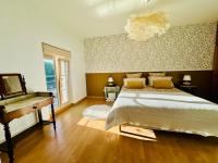 Chambre Lit Queen-Size Deluxe