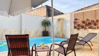 Paraiso a Beira Mar - Sobrado com 6 Suites, Piscina, Ar Condicionado, Wi-Fi, Churrasqueira e Vista para as Montanhas - Chambres d'hôtes Peruíbe