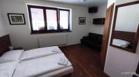 Doppel- oder Zweibettzimmer