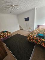 Tweepersoonskamer met 1 of 2 Bedden en Gedeelde Badkamer