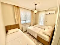 Appartement met 2 Slaapkamers en Terras - Uitzicht op Zee