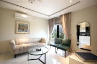 One-Bedroom Apartment with Balcony and City View