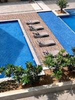 Resort Style Studio near Mactan - Cebu Airport - with Pool & Gym - B&B Pusok