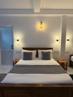 Camera Quadrupla con Vista Giardino 