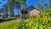 Villa Salme lemmikkiystävällinen mökki Taivalkoskella Jokijärven rannalla - Chambres d'hôtes Taivalkoski