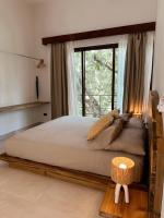 Suite mit Kingsize-Bett und Balkon