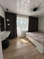 современная квартира рядом с парком - Bed and Breakfast Taraz