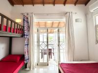 Camera Quadrupla con Bagno in Comune 