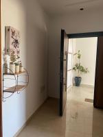 Charming 2-Bedroom Apartment with Garden View Balcony - Chambres d’hôtes Hammamet