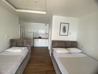 Standard Dreibettzimmer mit Meerblick