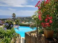 Bilocale vista mare con giardino privato e piscina - B&B Sanremo
