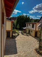 Ferienwohnung 'Ginkgo' mit verwunschenem Garten & privater Sauna - Ferienwohnung Hofheim in Unterfranken