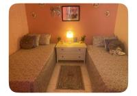 Chambre lits face to face, serviettes, café ou thé offert - B&B Dakar