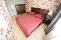 Suite mit 2 Schlafzimmern mit Queensize-Bett und Schlafsofa.