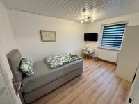 Four-Bedroom Apartment with Balcony 