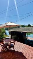 Casa no Térreo - Vista para o Canal da Barra da Lagoa - Chambres d’hôtes Florianópolis