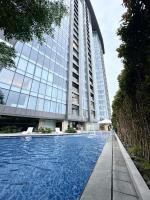 Minimalist 1BR Condo with NETFLIX at AEON TOWERS near Abreeza Mall by Rico - Chambres d'hôtes Davao