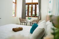 Kamer met Queensize Bed en Uitzicht op de Tuin