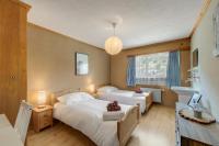 Chambre Lits Jumeaux avec Salle de Bains Commune