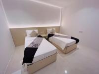 Tweepersoonskamer met 2 Aparte Bedden