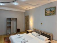 Camera Tripla Superior