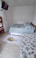 KITNET S1 em TORRES-RS - Na mais bela praia Gaúcha - Cozinha - Banheiro - Ar condicionado - TV e Wi-Fi - Estacionamento - Anfitriã Superhost no BnB - Chambres d'hôtes Torres