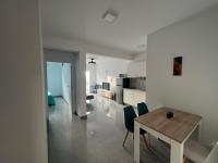 One-Bedroom Apartment with Balcony and Sea View