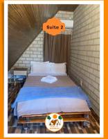 Chalés do AVOHAY, lindo chalé com privativa banheira hidromassagem aquecida, apenas 2 minutos da Vila de São Jorge Chalé Guita - Ferienwohnung São Jorge