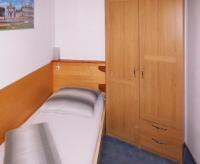 Camera Singola con Doccia e Servizi Igienici in Comune