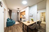 One-Bedroom Apartment with Balcony and City View