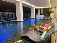 Cozy 38 park avenue inside IT Park Lower Floor studio apartment - Chambres d'hôtes Cebu
