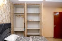 Four-Bedroom Apartment with Balcony 