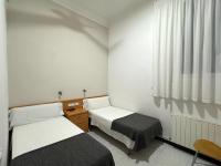 Tweepersoonskamer met 2 Aparte Bedden